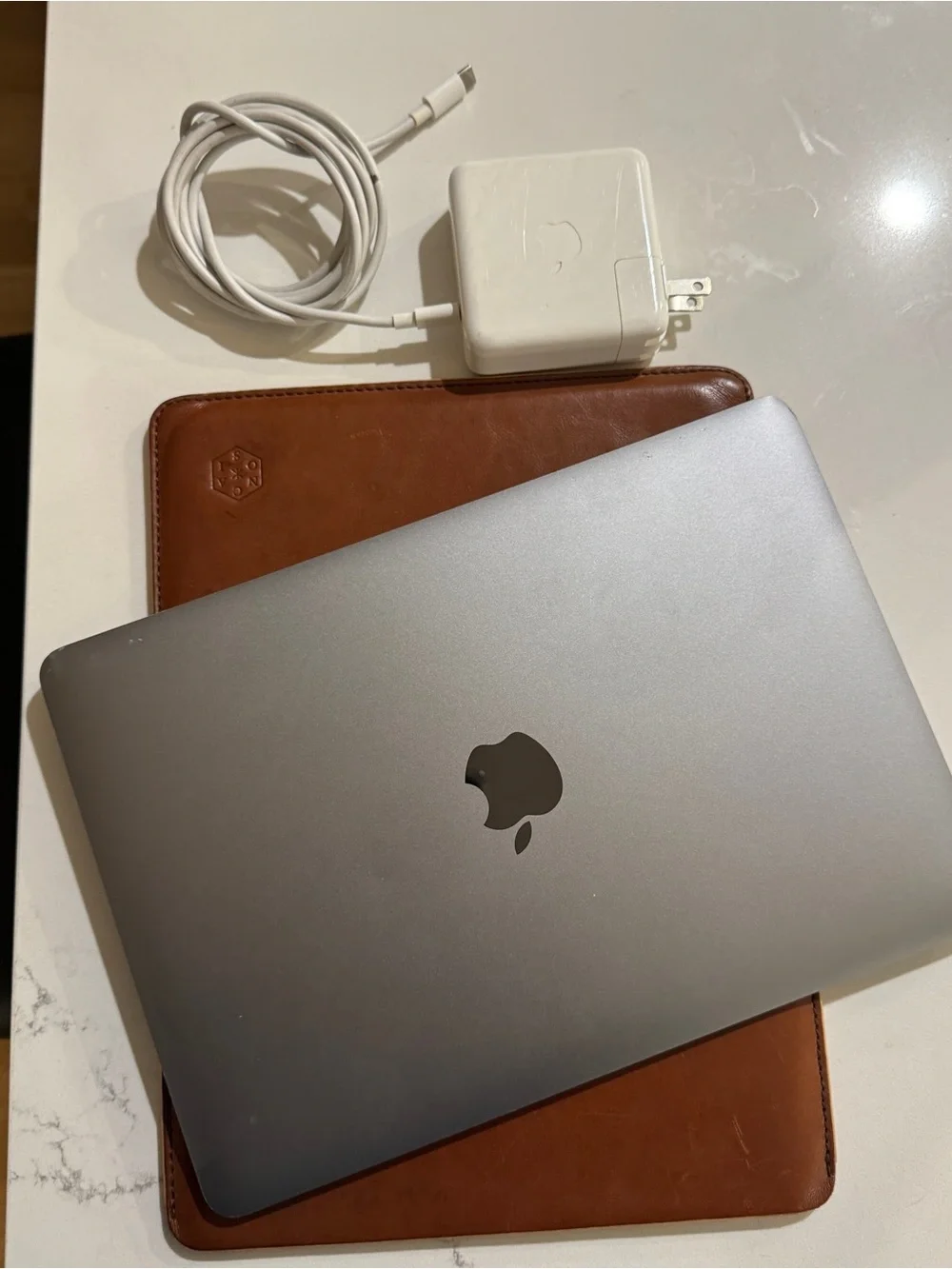 Used 2015 Apple MacBook in Space Gray with Charger and Sleeve case